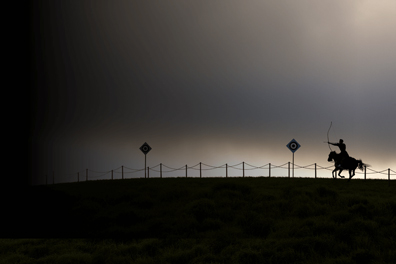Horse and rider silhouette at dusk, symbolising Mazda innovation, Jinba Ittai, Mazda design, and Mazda safety control.